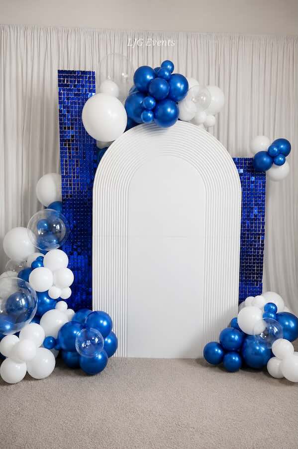 Blue and white balloon arch event backdrop