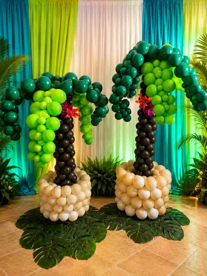 Tropical palm trees crafted from colorful balloons